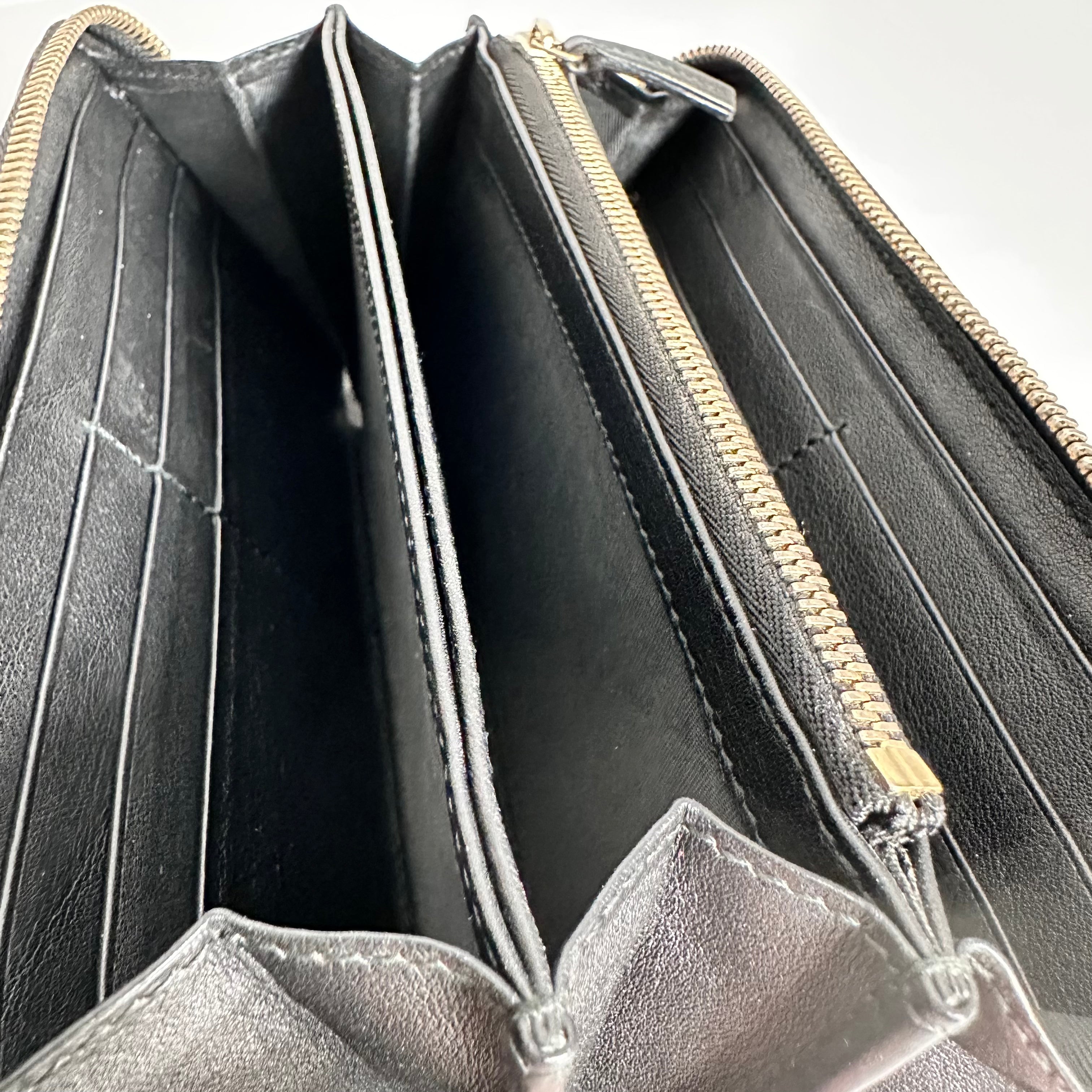 Black Guccissima Zippy Wallet