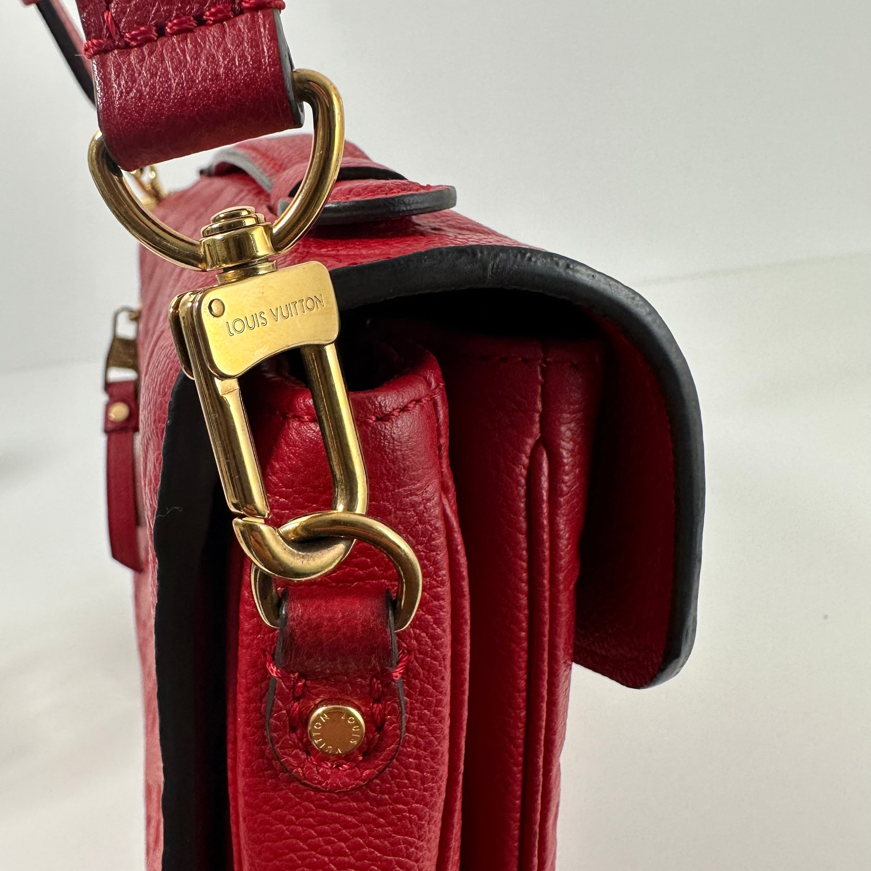 Red Monogram Empreinte Pochette Métis