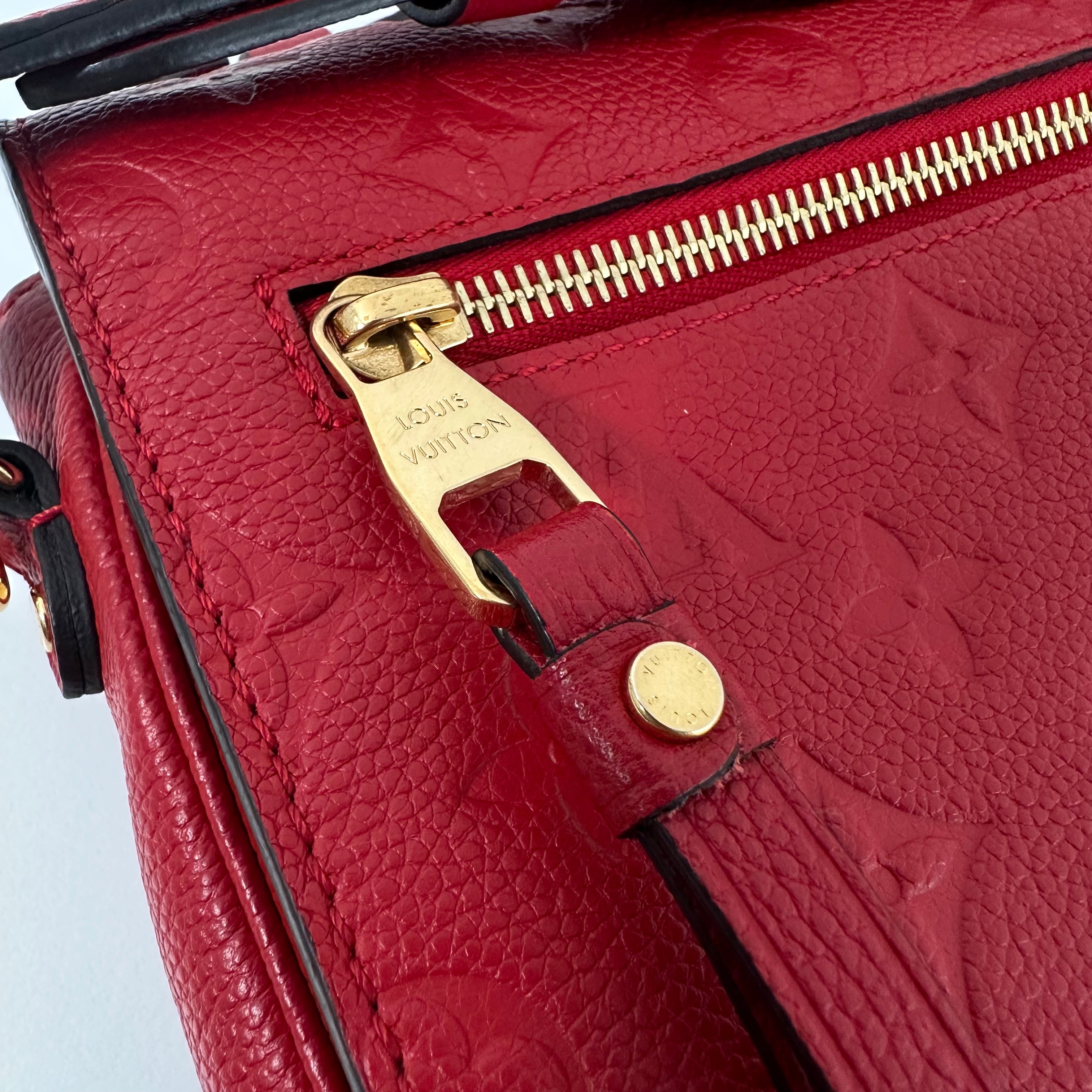 Red Monogram Empreinte Pochette Métis