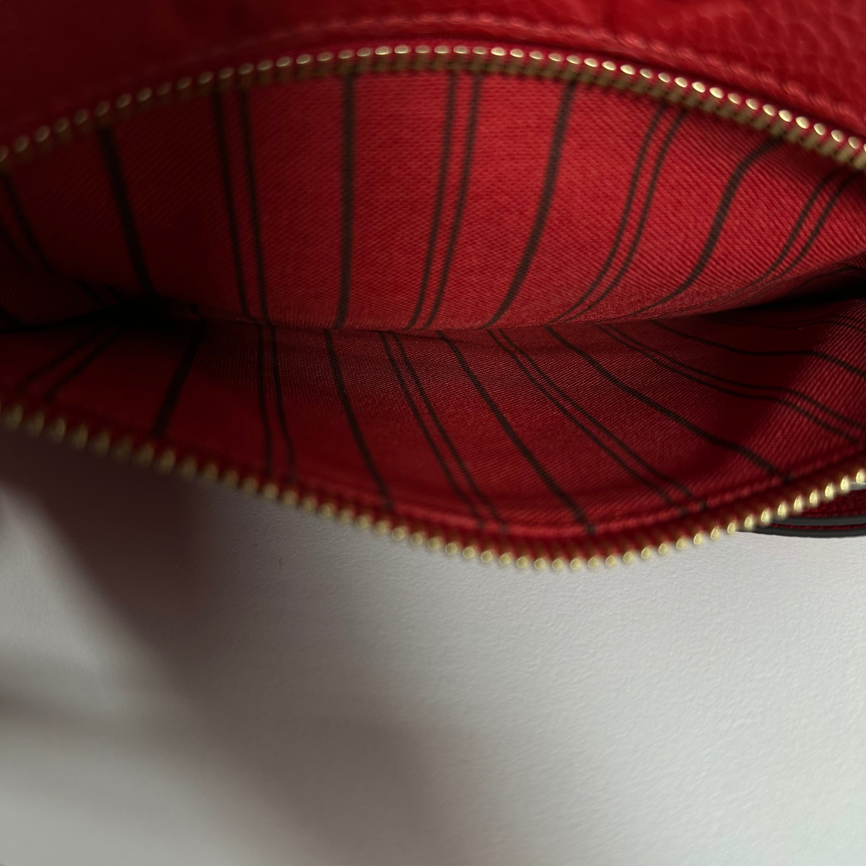 Red Monogram Empreinte Pochette Métis