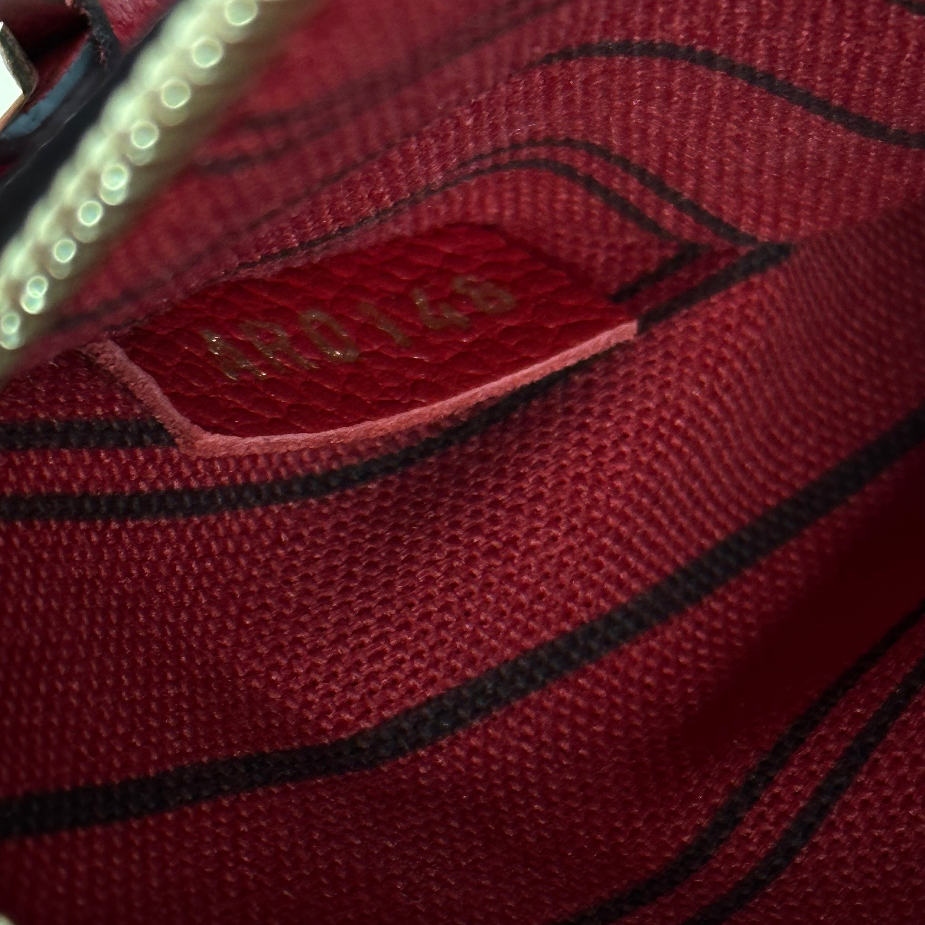 Red Monogram Empreinte Pochette Métis