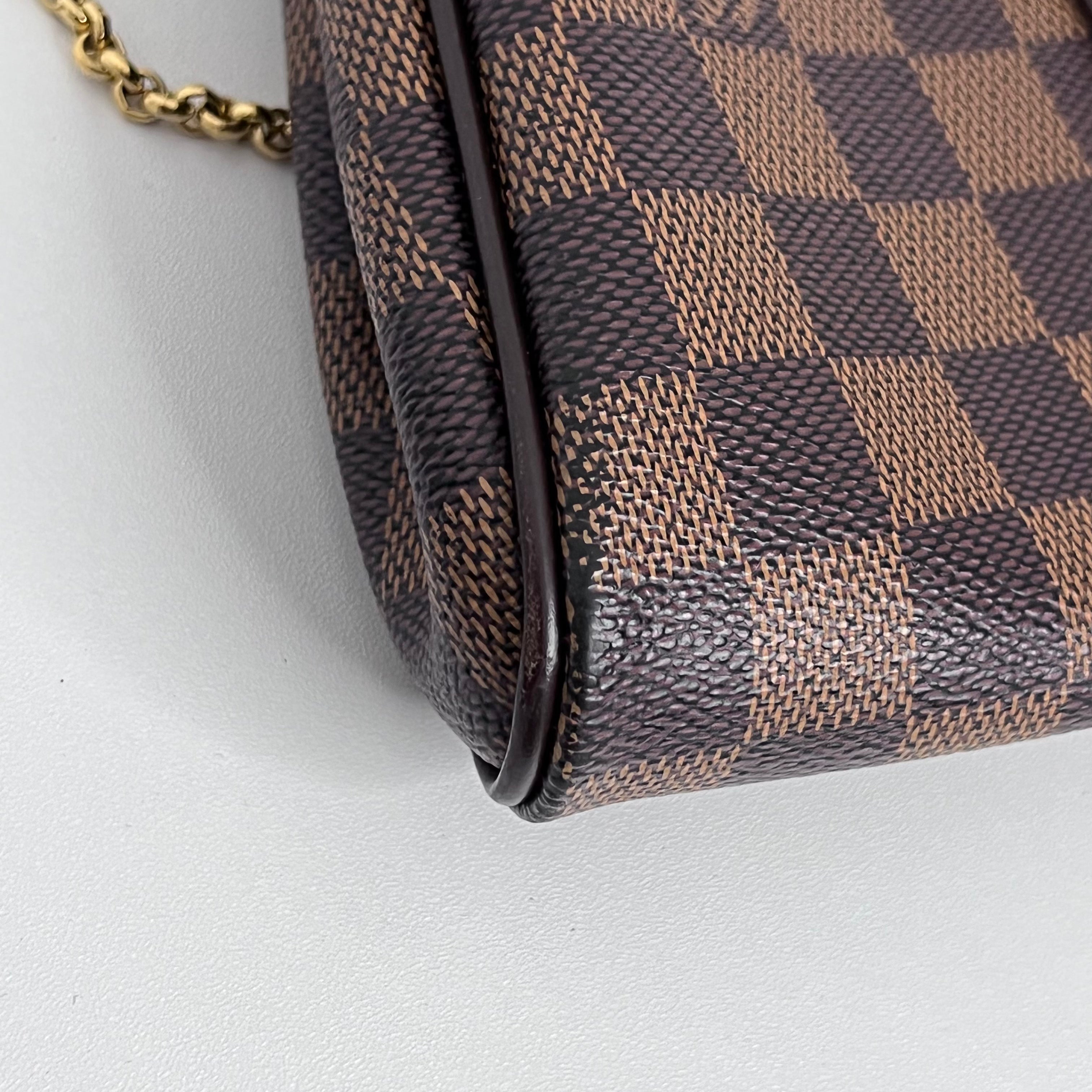 Damier Ebene Pochette Eva