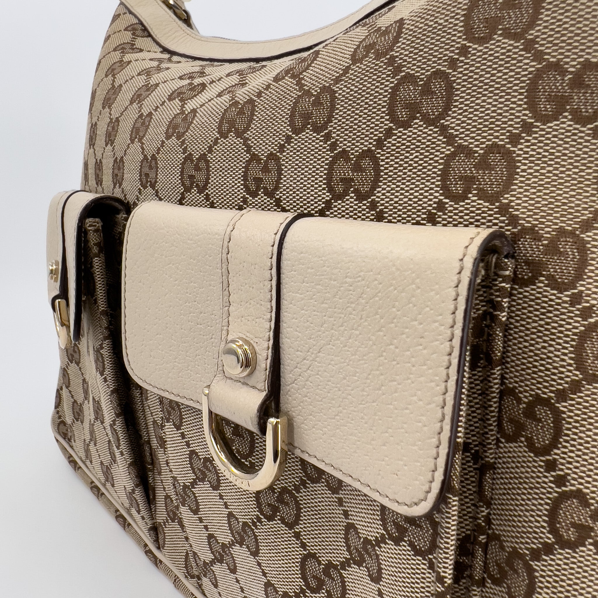 GG Monogram Ivory Canvas Pocket Hobo Bag
