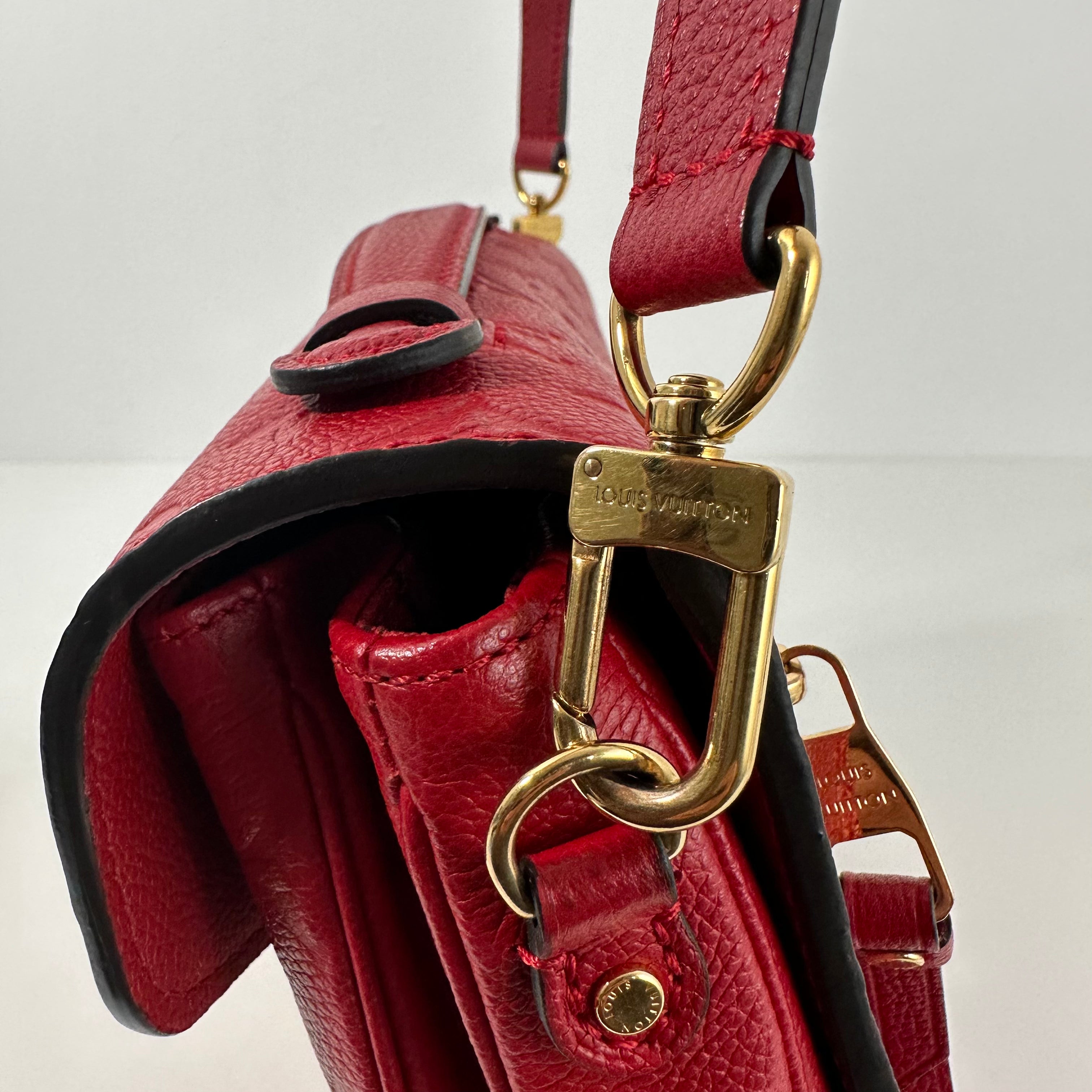 Red Monogram Empreinte Pochette Métis